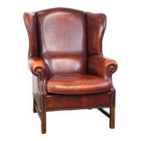 Large comfortable sheepleather wingchair in good condition and beautiful colours
