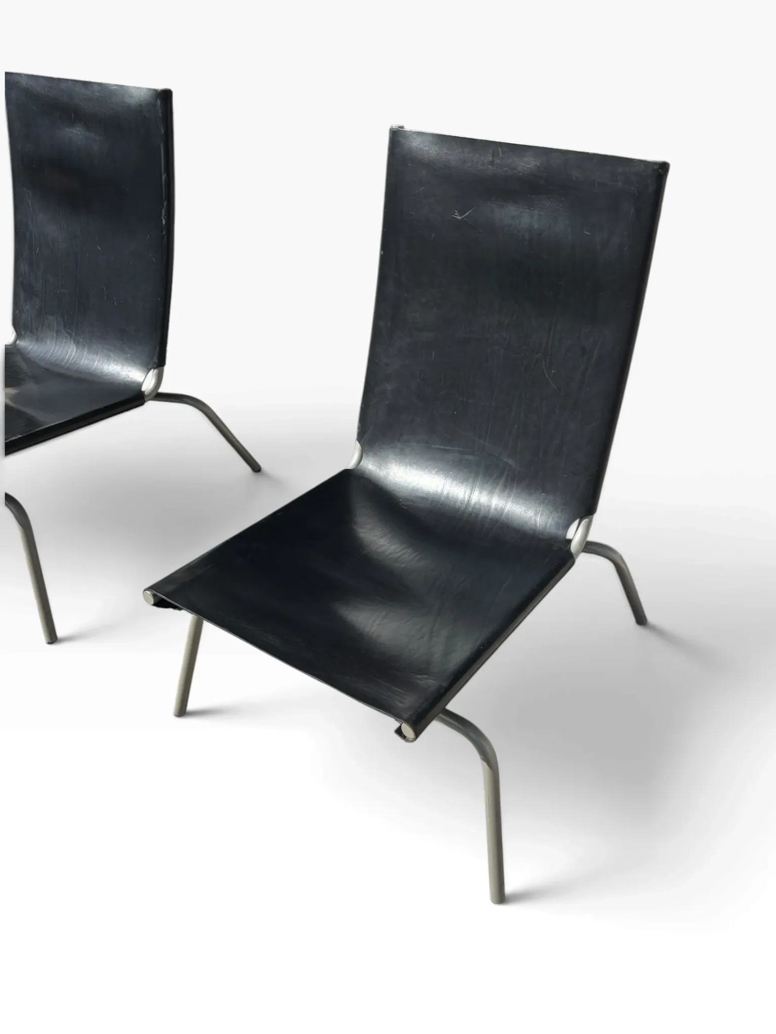 Set of 2 Crossed Legged lounge chairs by Fabiaan van Severen.