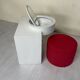 Bathroom toilet with a 70s pouf.