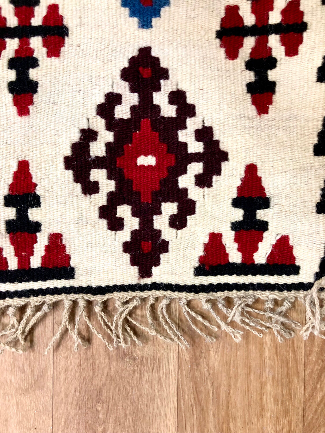 Small ethnic carpet