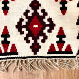 Small ethnic carpet