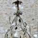 Italian cage chandelier decorated with ceramic roses and glass paste pendants