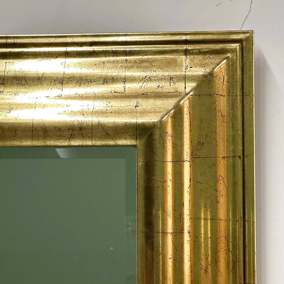 Very large Deknudt mirror with faux gold leaf frame, 1980s. Belgium