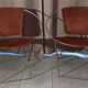 Paire de fauteuils en cuir marron clair