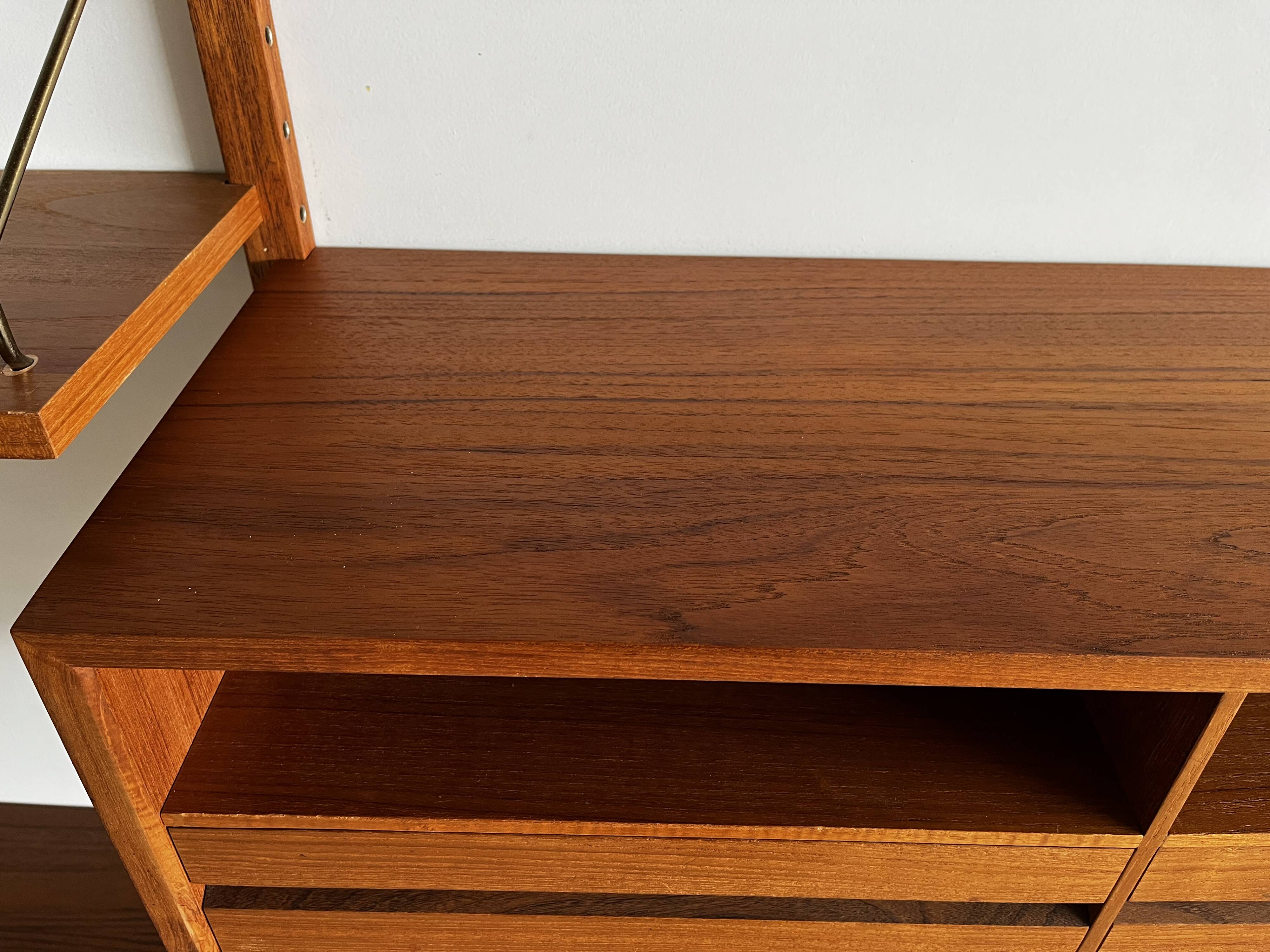 A wall unit with 4 compartments by Poul Cadovius, Denmark, 1960s.