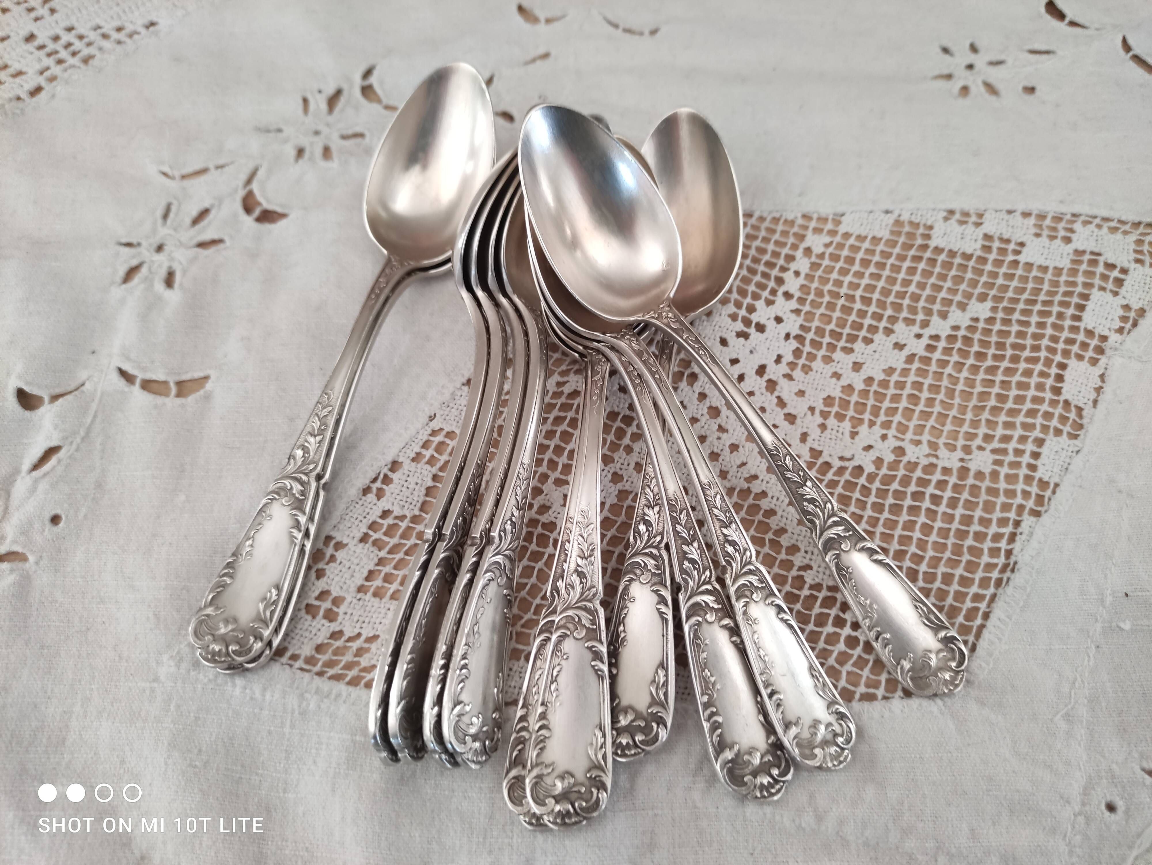 Lot of 12 small old spoons in silver metal