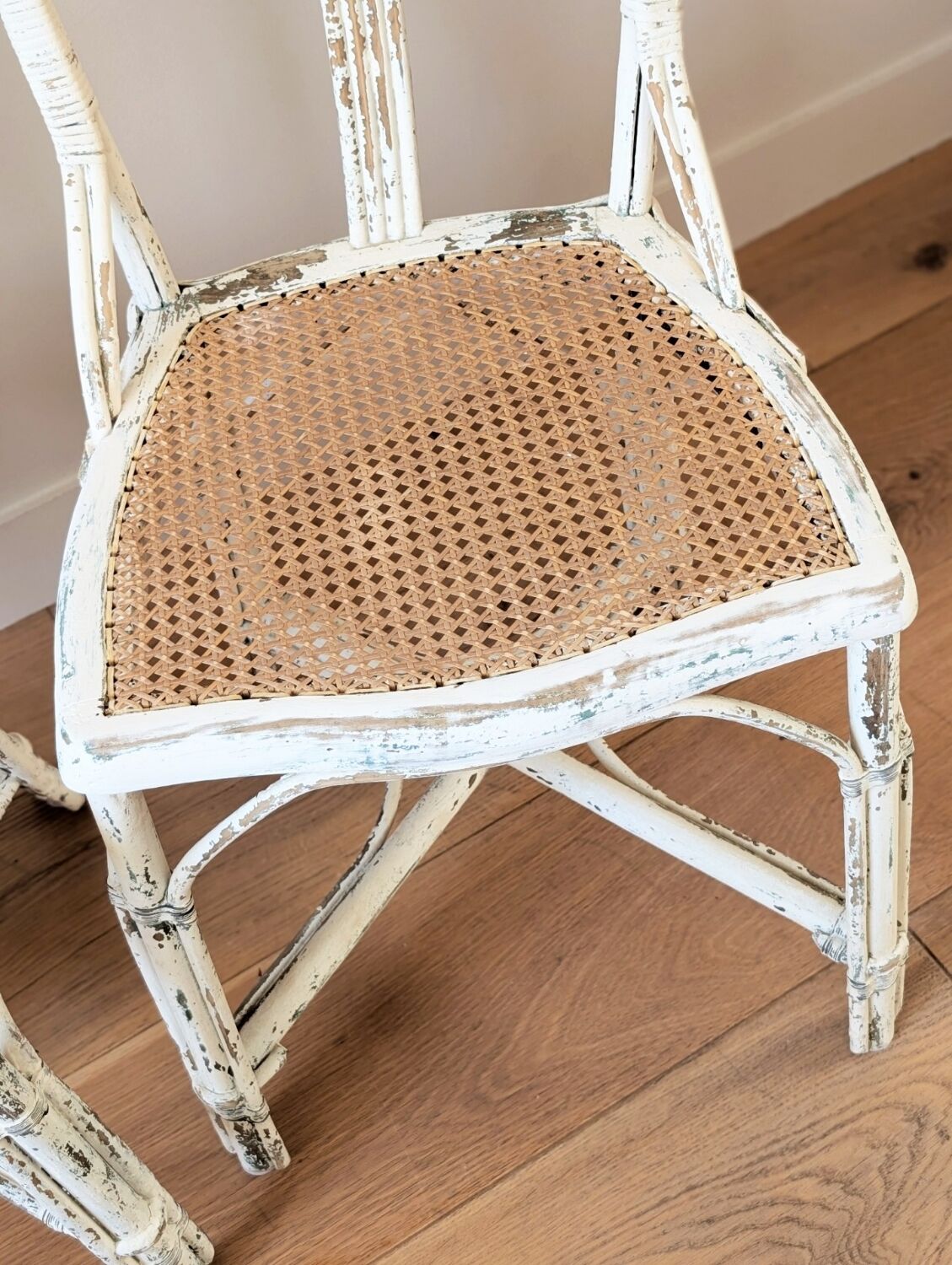 Pair of vintage restaurant chairs in rattan
