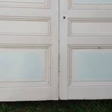 Pair of cupboard doors and old woodwork frame