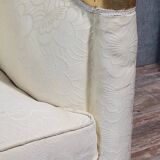 Banquette vintage à dossier capitonné, revêtu d’un tissu ivoire