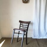 Set of 4 bistro chairs in curved wood and vintage red skai seats.