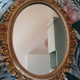 Miroir sculpté en bois et feuille d'or polychrome