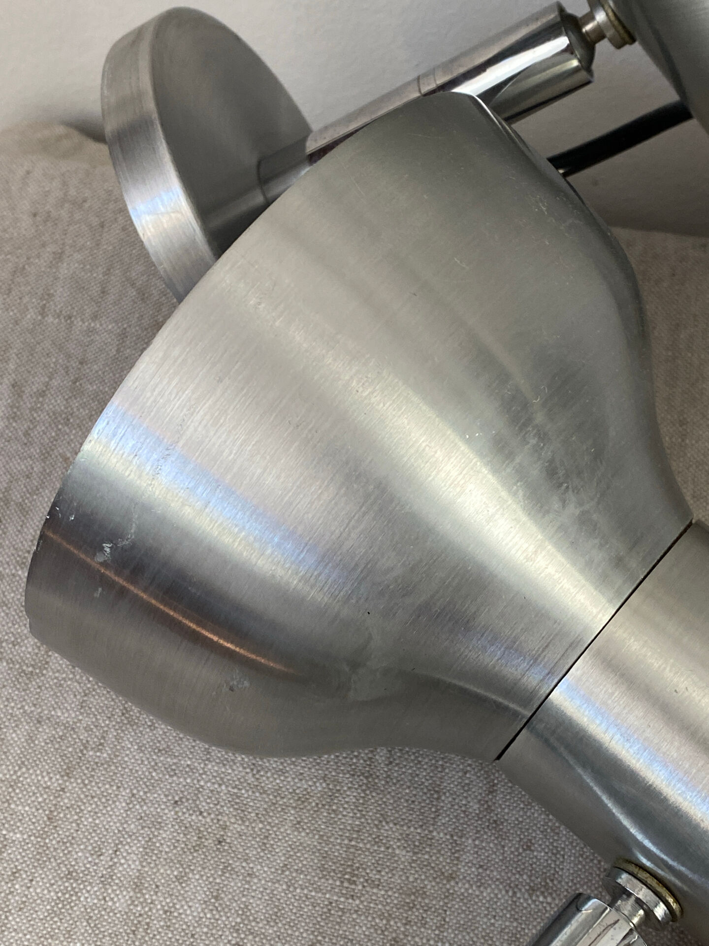 Pair of brushed metal wall sconces