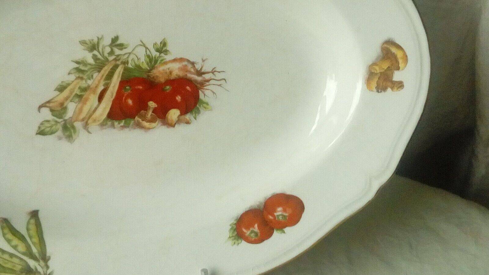 Hollow and oval earthenware dish with 4 seasons vegetable decoration