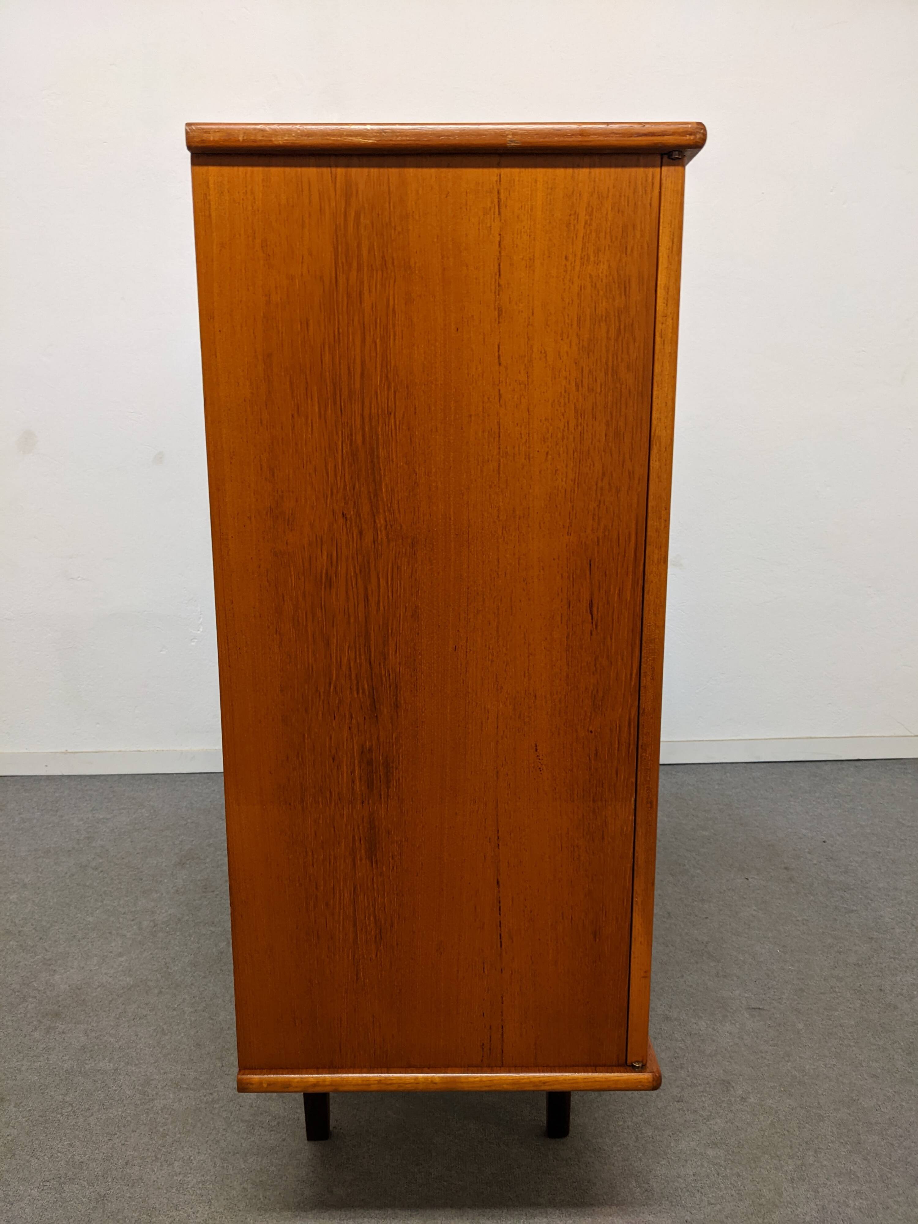High sideboard, display cabinet and secretary, Scandinavian in teak, France around 1960.