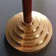 Two vintage wooden and brass candlesticks.