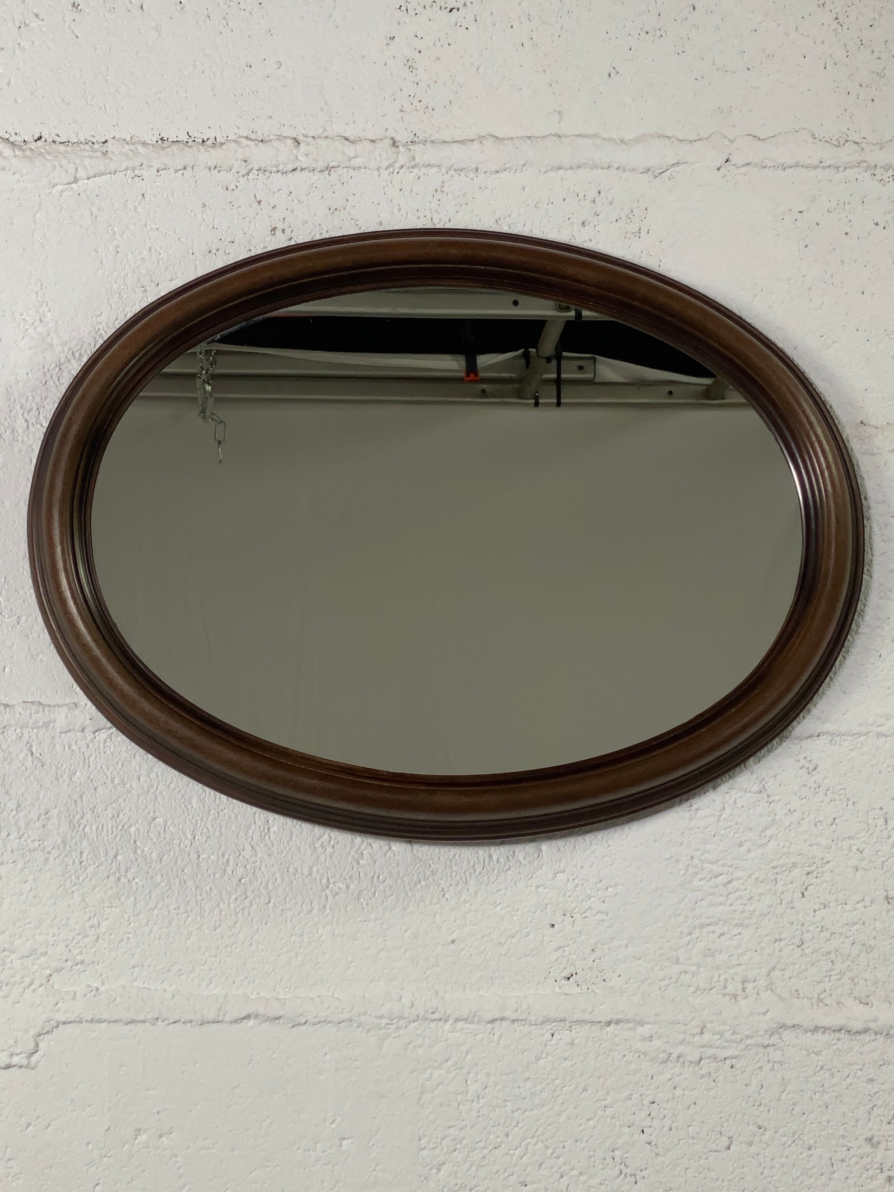 Oval wooden mirror