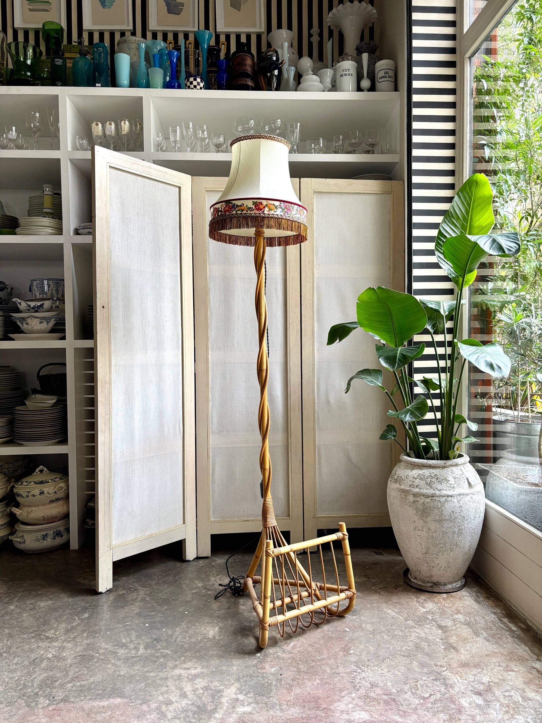 Rattan lamp post base with magazine holder