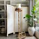 Rattan lamp post base with magazine holder