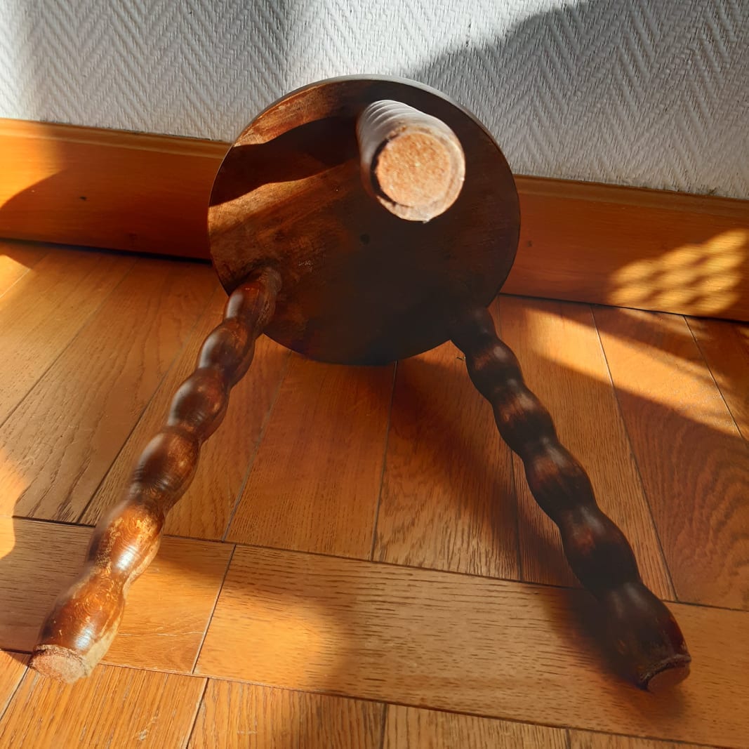 Turned wooden tripod stool