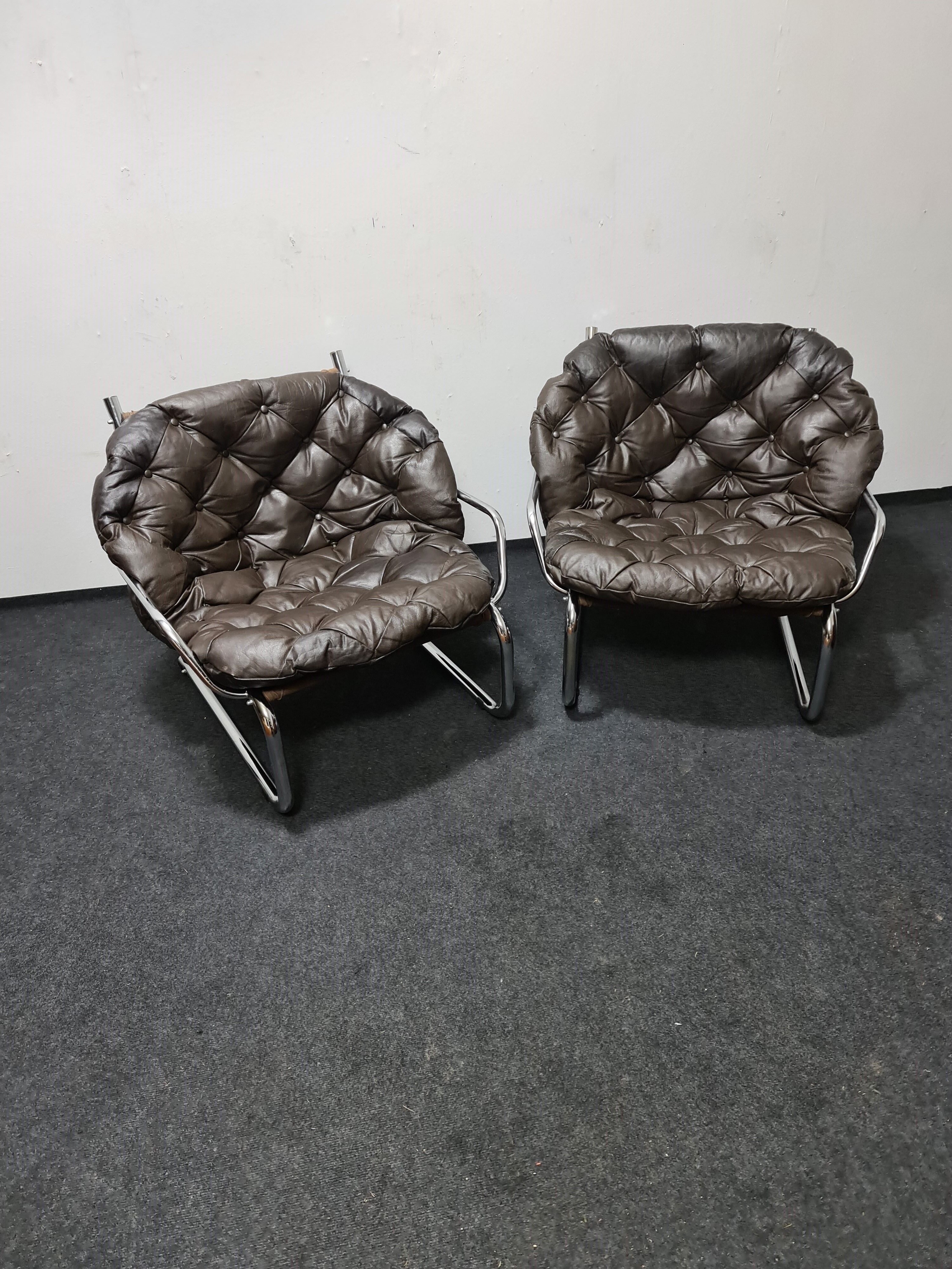 Pair of chrome and leather vintage chairs