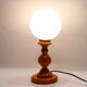 Vintage lamp in orange turned wood and opaline globe