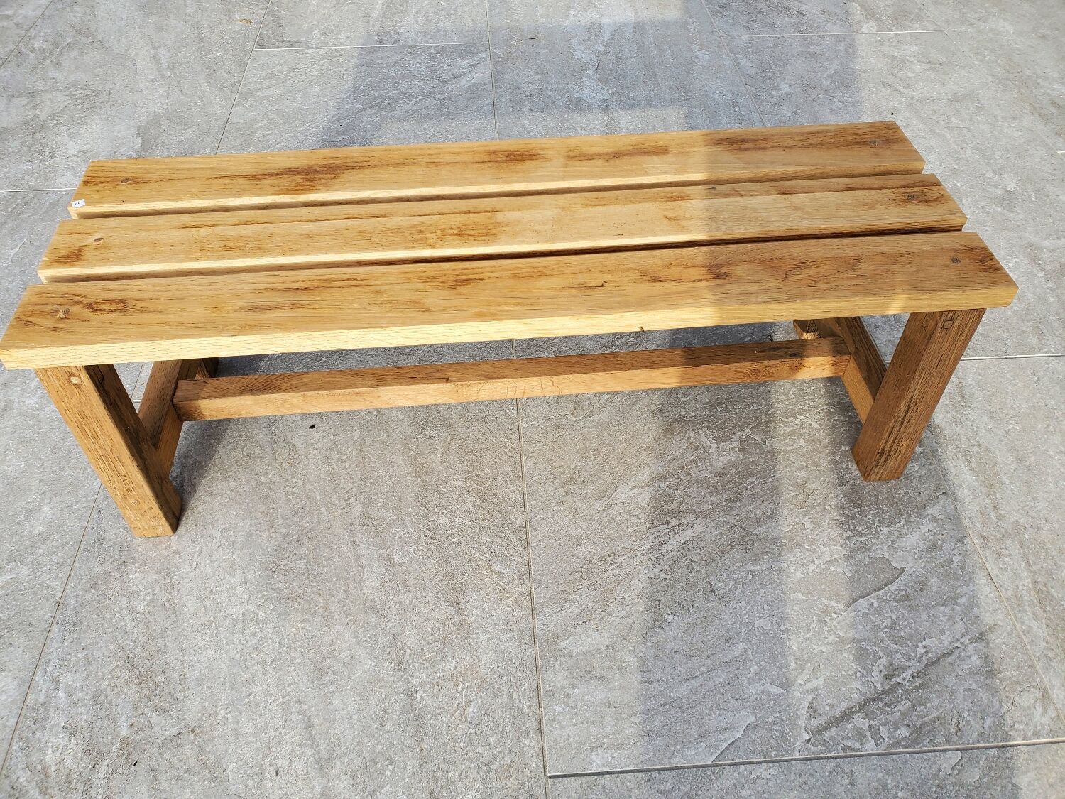 Small bench in raw oak