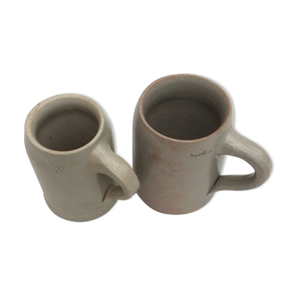 Duo of grey sandstone mugs