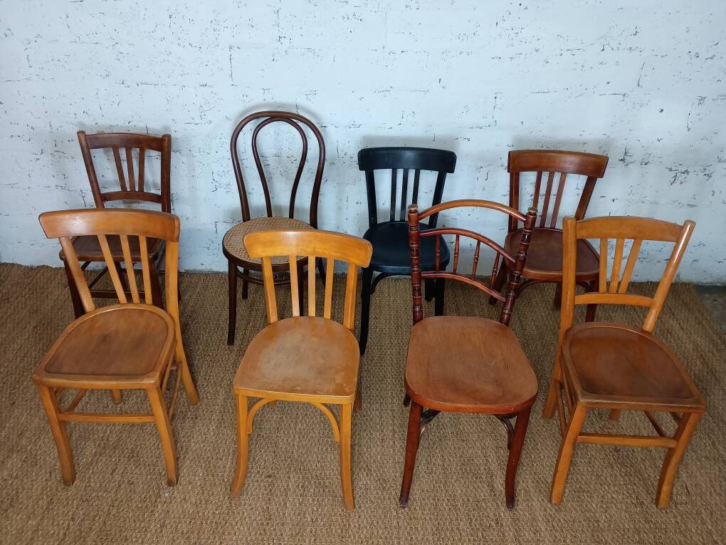 Set of 8 mismatched vintage bistro chairs