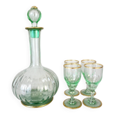 Liqueur carafe with its glasses, green and gold.