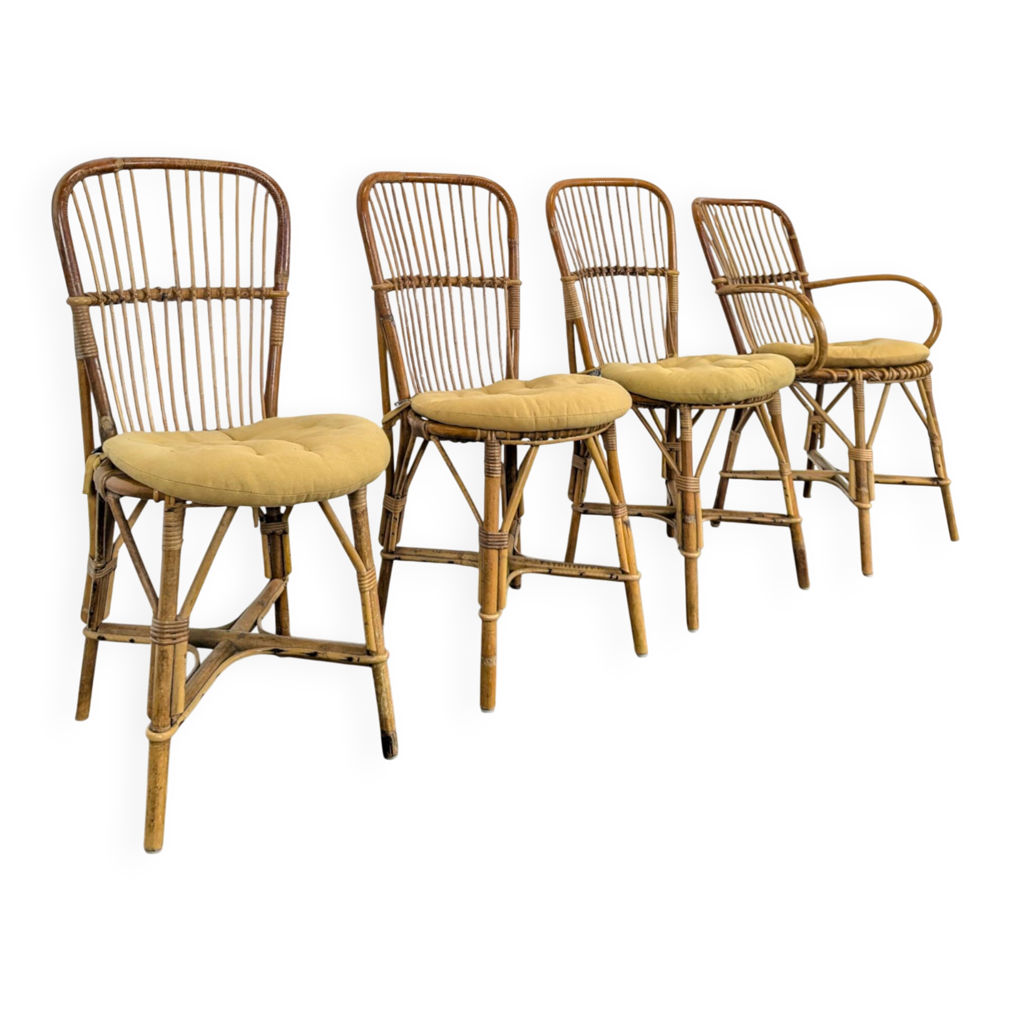 Set of 3 chairs and a rattan armchair.