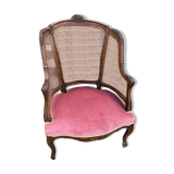 Louis XV style walnut and cane armchair