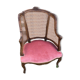 Louis XV style walnut and cane armchair