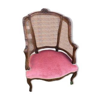 Louis XV style walnut and cane armchair