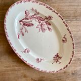 Old oval dish in iron earth