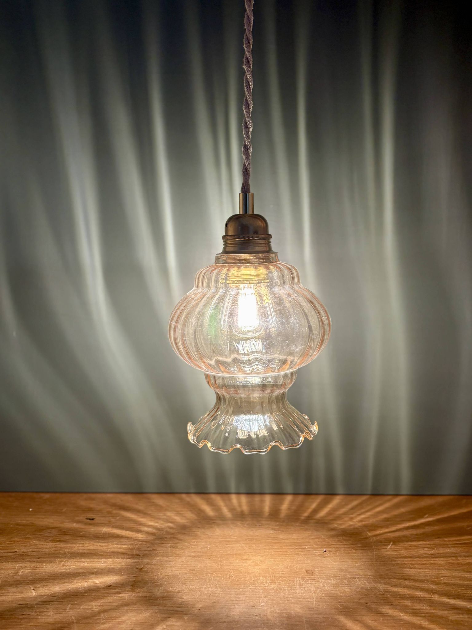 Vintage amber glass globe pendant light