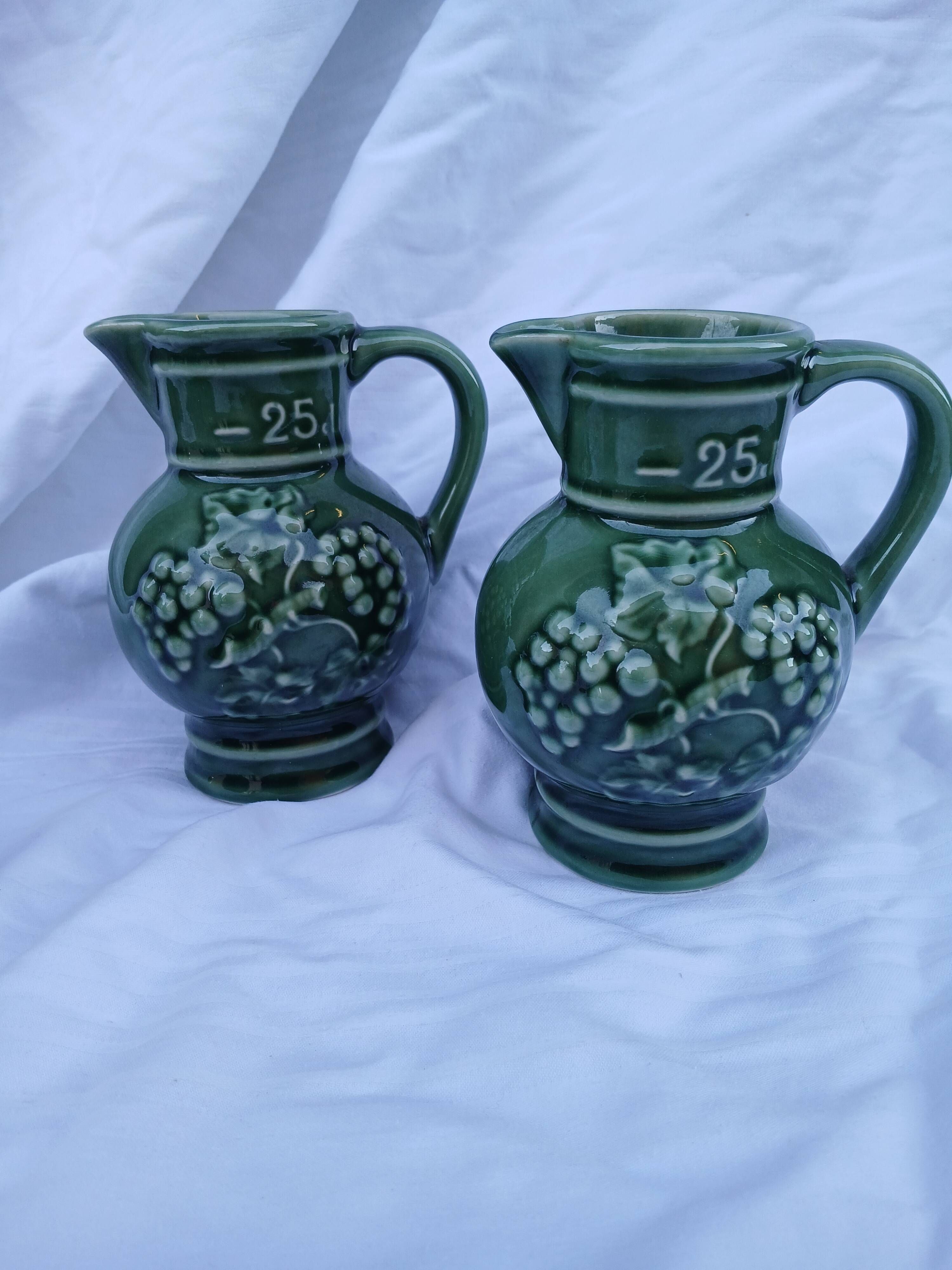 3 antique wine jugs