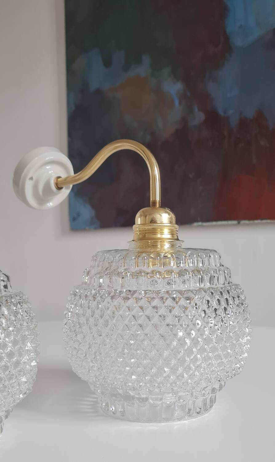 Pair of chiseled glass sconces