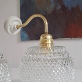 Pair of chiseled glass sconces