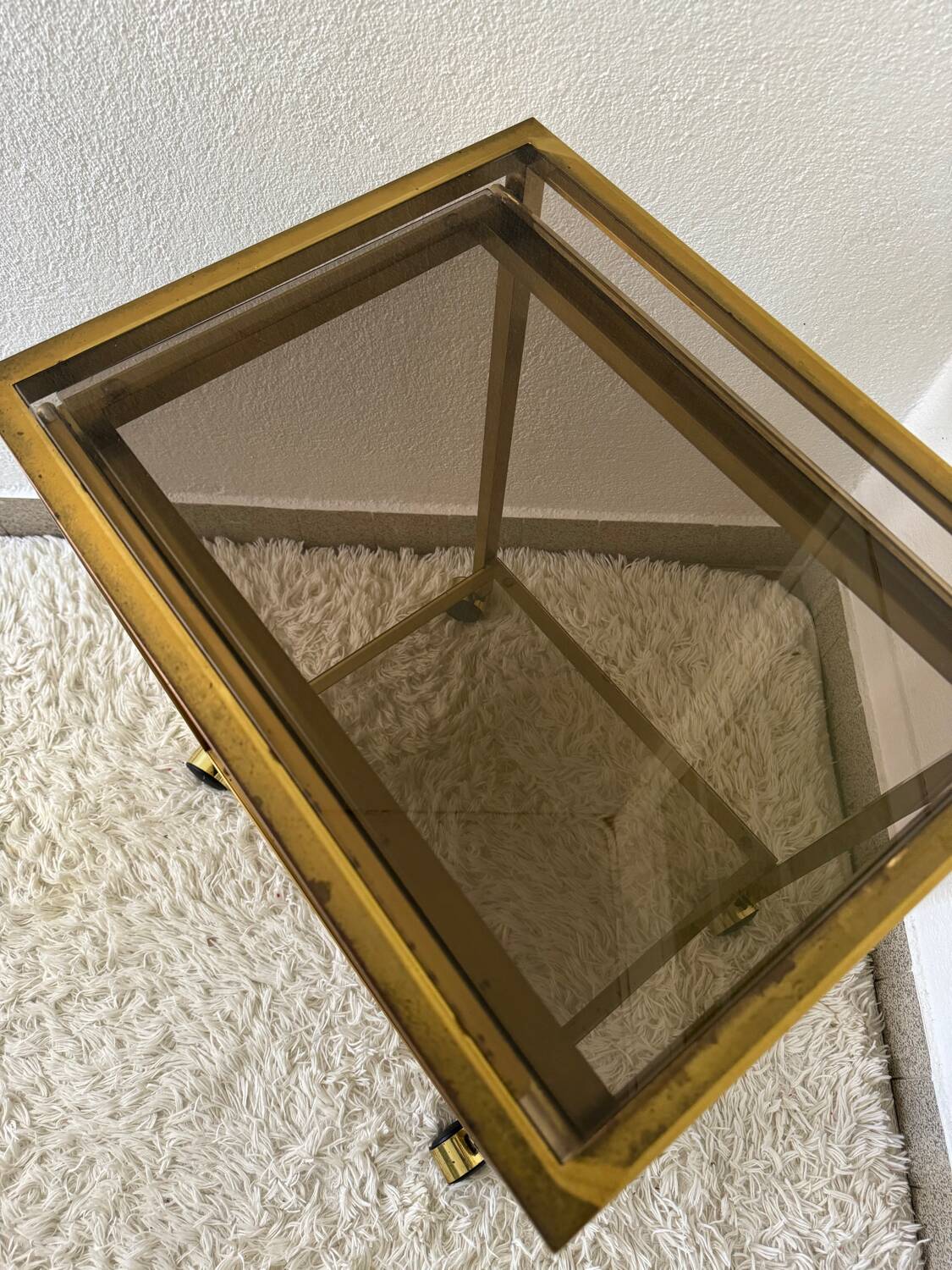 Brass rolling trolley with smoked glass from the 70s