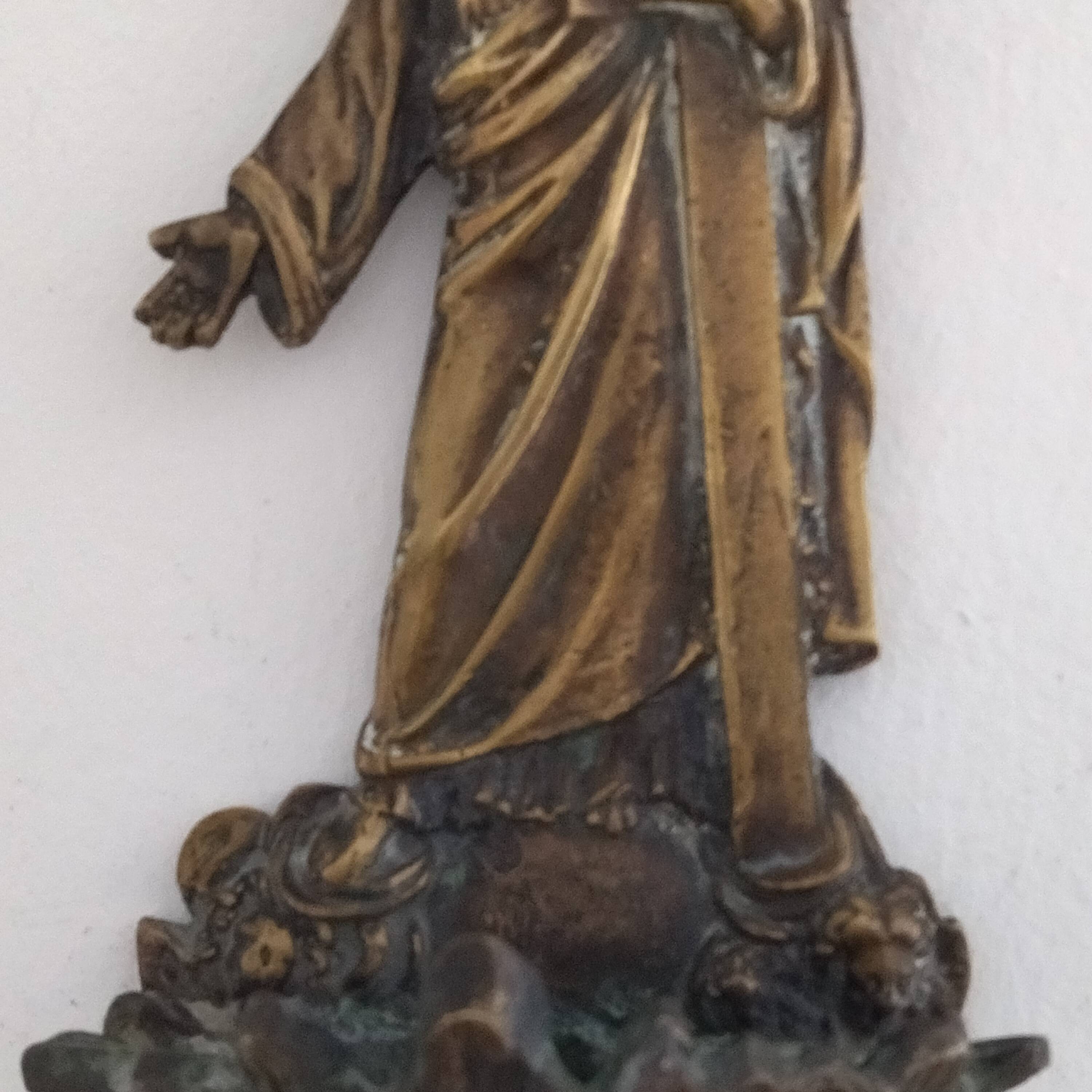 Antique bronze holy water font