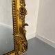 Large Napoleon III mirror with wooden gilded frame, 19th century, 200 cm.