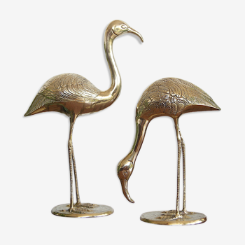 Herons in brass