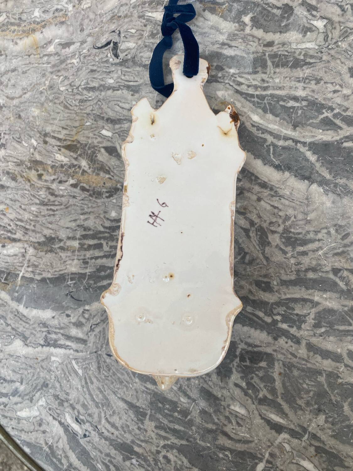 Antique holy water font in polychrome enamelled earthenware signed