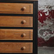 Black and natural wood chest of drawers with 4 drawers