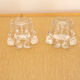 2 bougeoirs en verre transparent