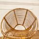 Vintage rattan spiral basket armchair