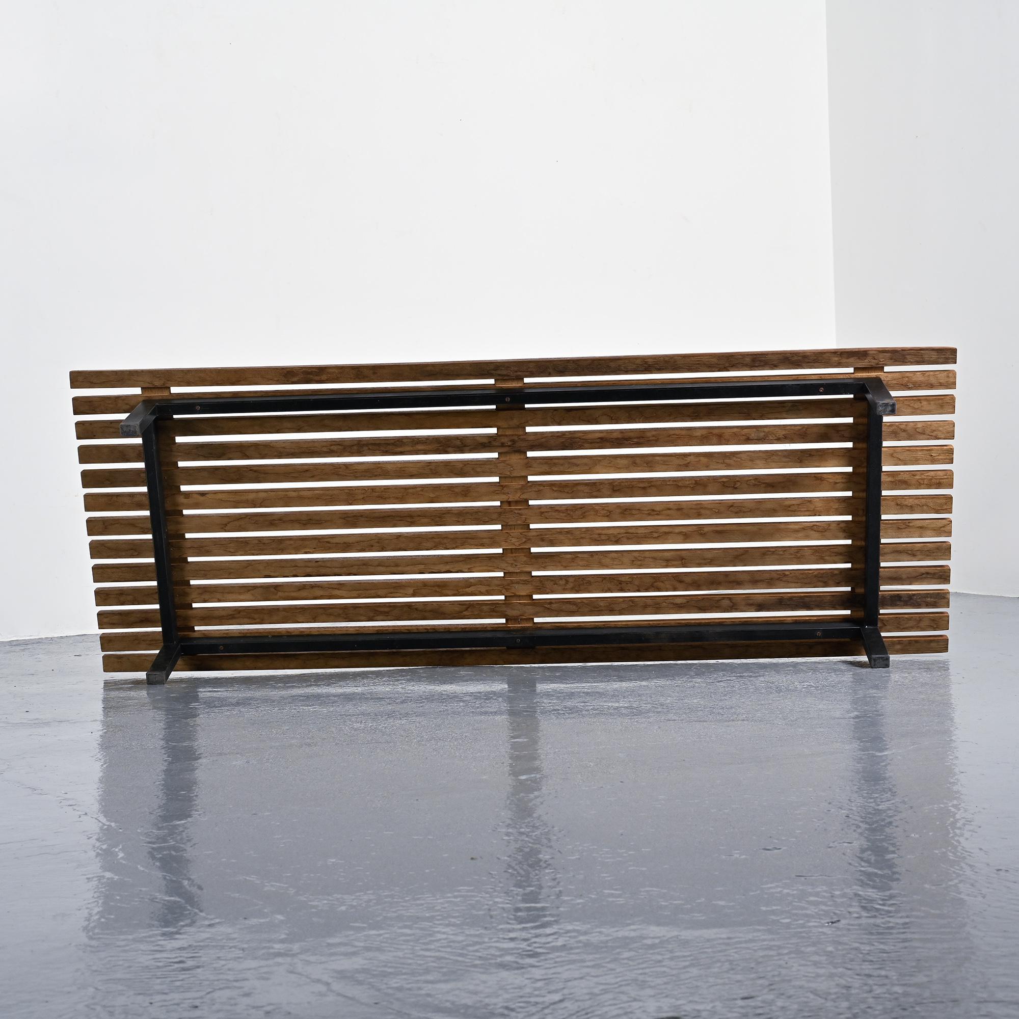 Cansado bench in mahogany by Charlotte Perriand, circa 1962.