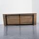 Cansado bench in mahogany by Charlotte Perriand, circa 1962.