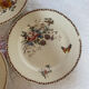 Set of 3 flat plates in polychrome ironstone E. Bourgeois