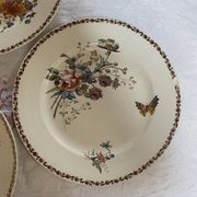 Set of 3 flat plates in polychrome ironstone E. Bourgeois
